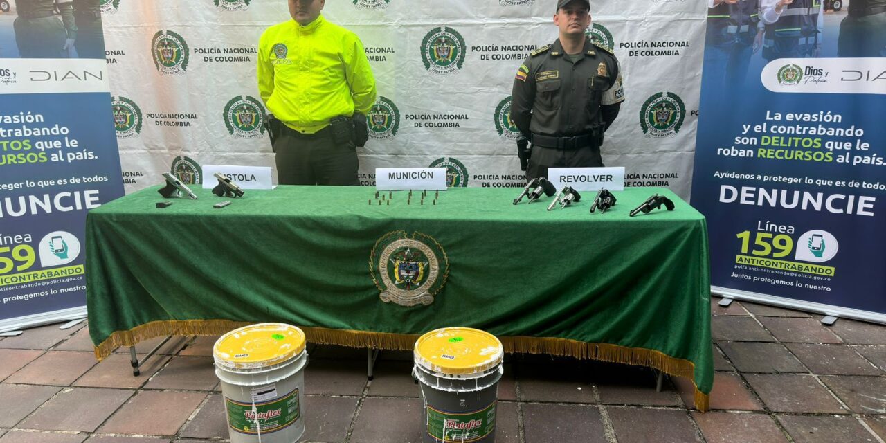 Hallan armamento en canecas de pintura en Terminal de Medellín